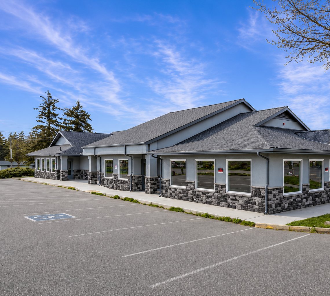 Modern single-story childcare facility exterior with stone accents in Oak Harbor, Washington